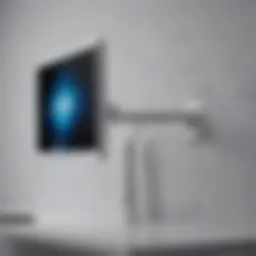Sleek wall-mounted monitor arm showcasing Apple device compatibility
