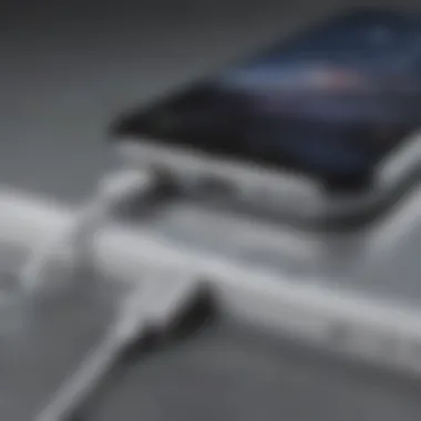 Close-up of USB-C to iPhone adapter connecting devices