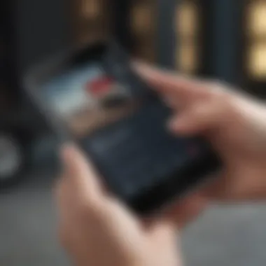 A close-up of a person's hand holding a smartphone with a pre-order confirmation.