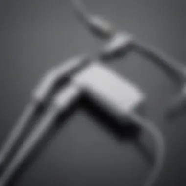 Diverse Charging Cords for Apple Devices Close-up view of various iPhone and iPad charging cords