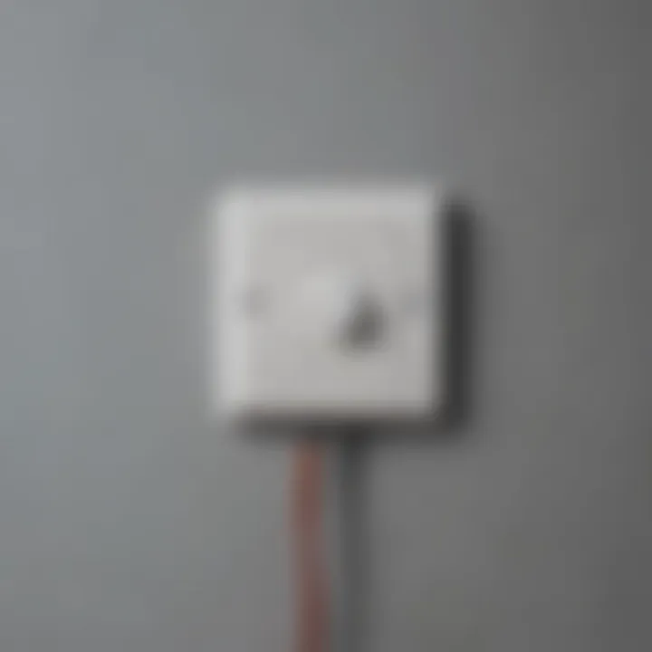 Close-up of a non-neutral dimmer switch installed on a wall