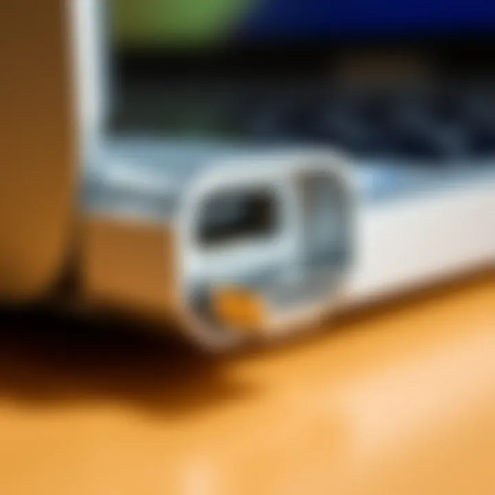 A close-up view of a USB-C plug and port on a MacBook Pro